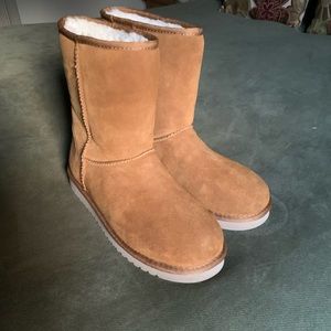 Brand new never worn Ugg boots size 8